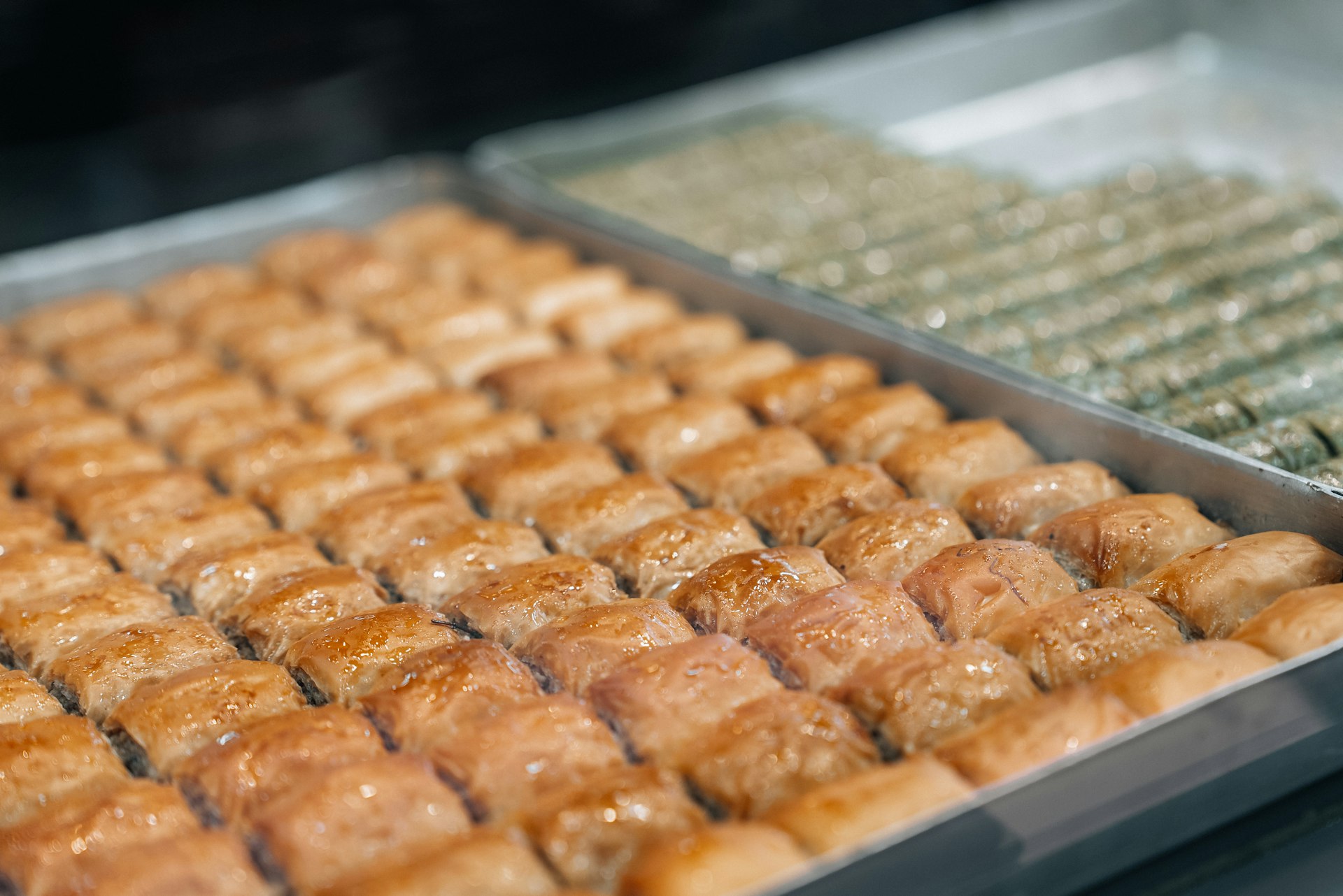 a close up of a tray of doughnuts